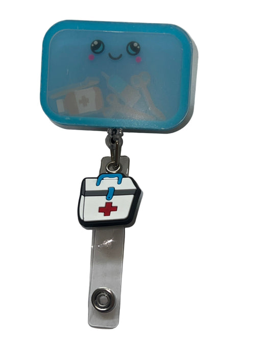 Happy Med Kit Shaker Badge Reel